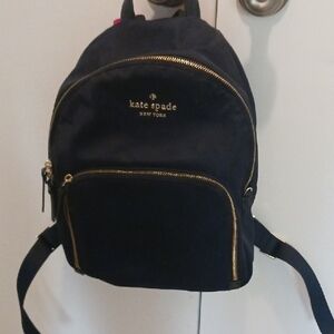 kate spade navy backpack with gold hardware